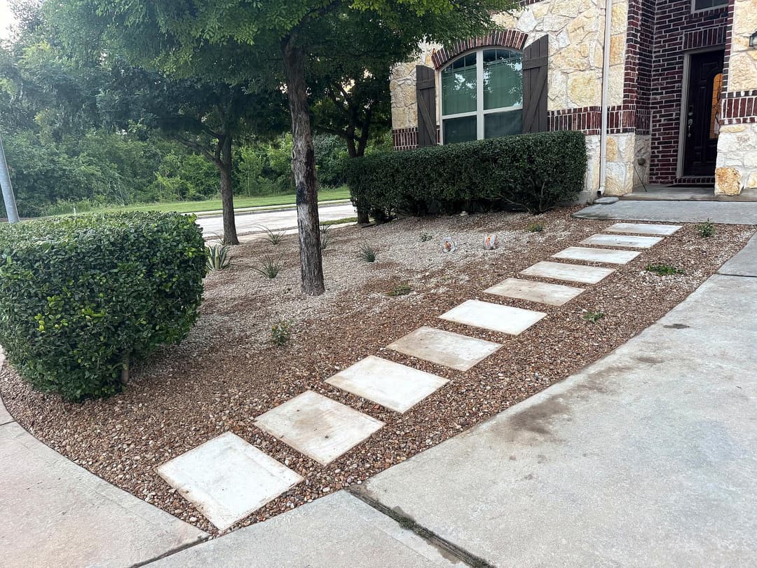 Modern backyard with a pool, wooden planter, and landscaped gravel area under a blue sky.